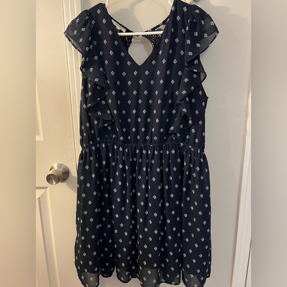 Navy dress with detailed sleeves and back